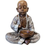 Small brown and silver Buddhist monk statue